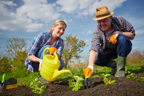 Community gardeners exchanging compost and second-hand pots