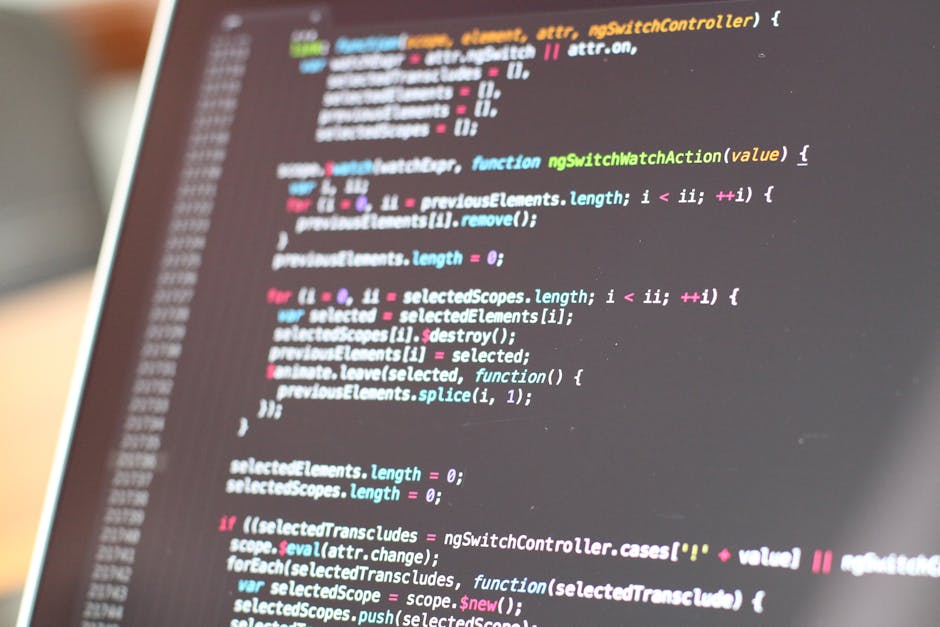 A close-up view of a computer screen displaying lines of colorful programming code, featuring syntax highlighting with functions, variables, and comments in various shades of pink, blue, green, and wh